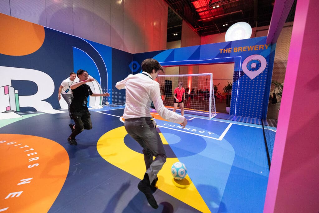 Advisors playing football against Lionesses at Xerocon London
